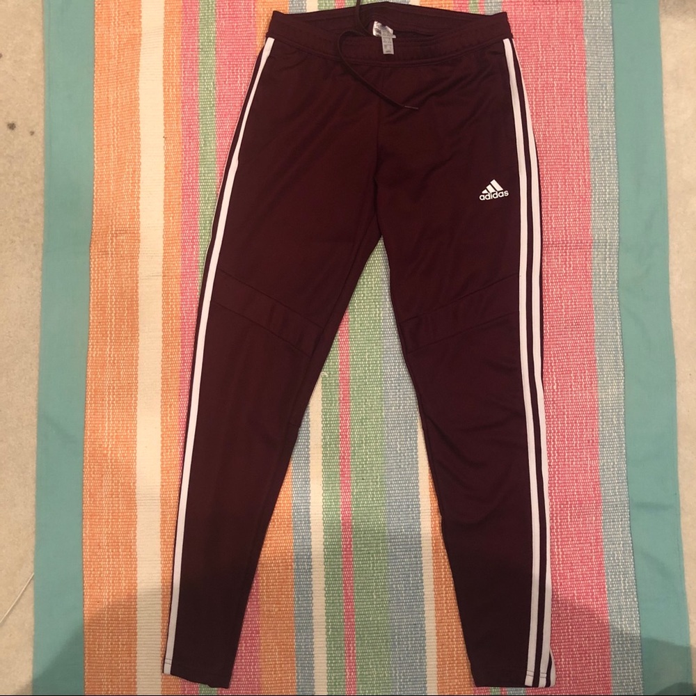 wine colored adidas track pants